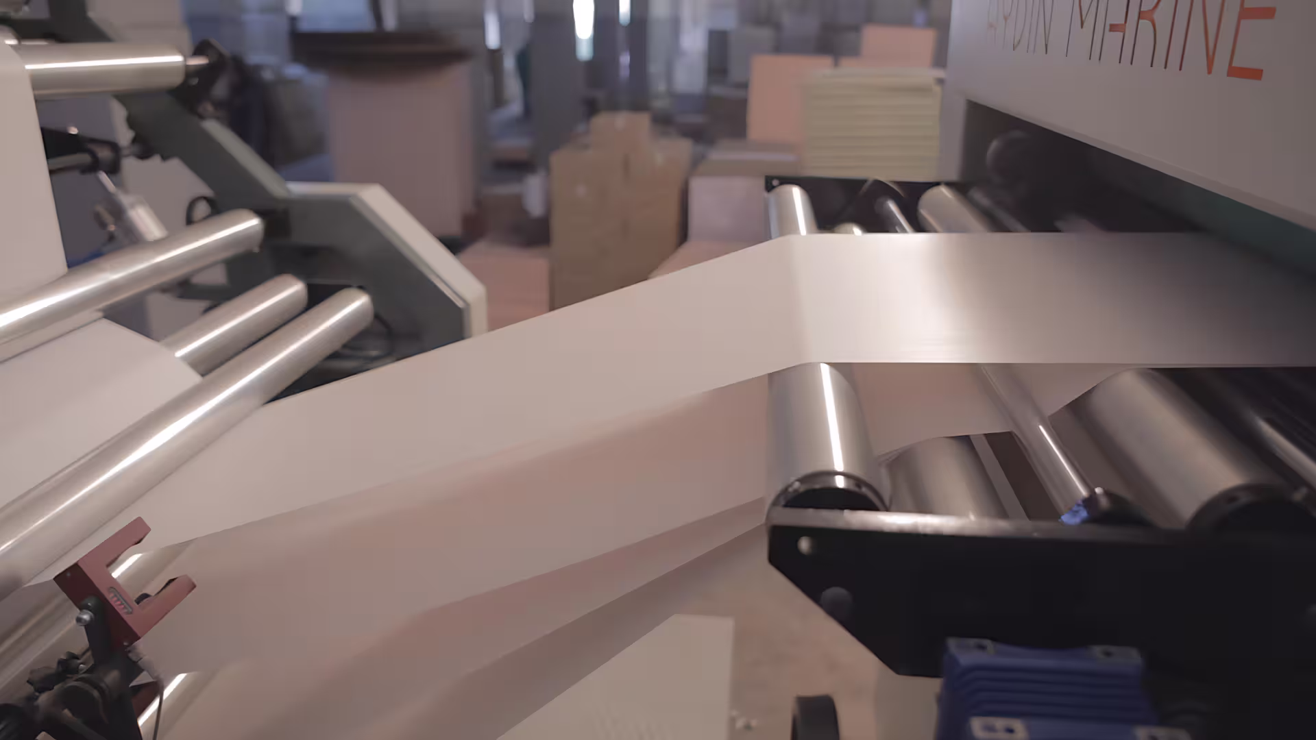 Four rolls decurler part of paper sheeter machine