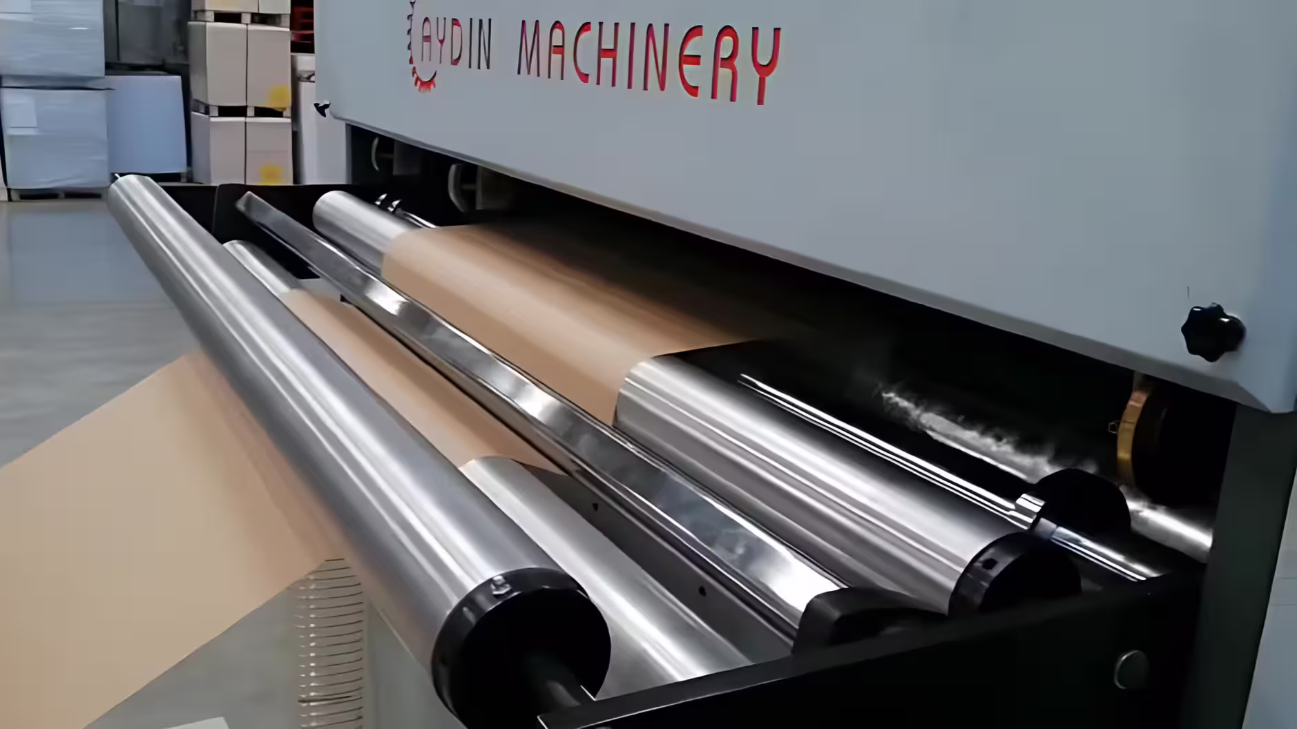 One roll decurler part of paper sheeter machine